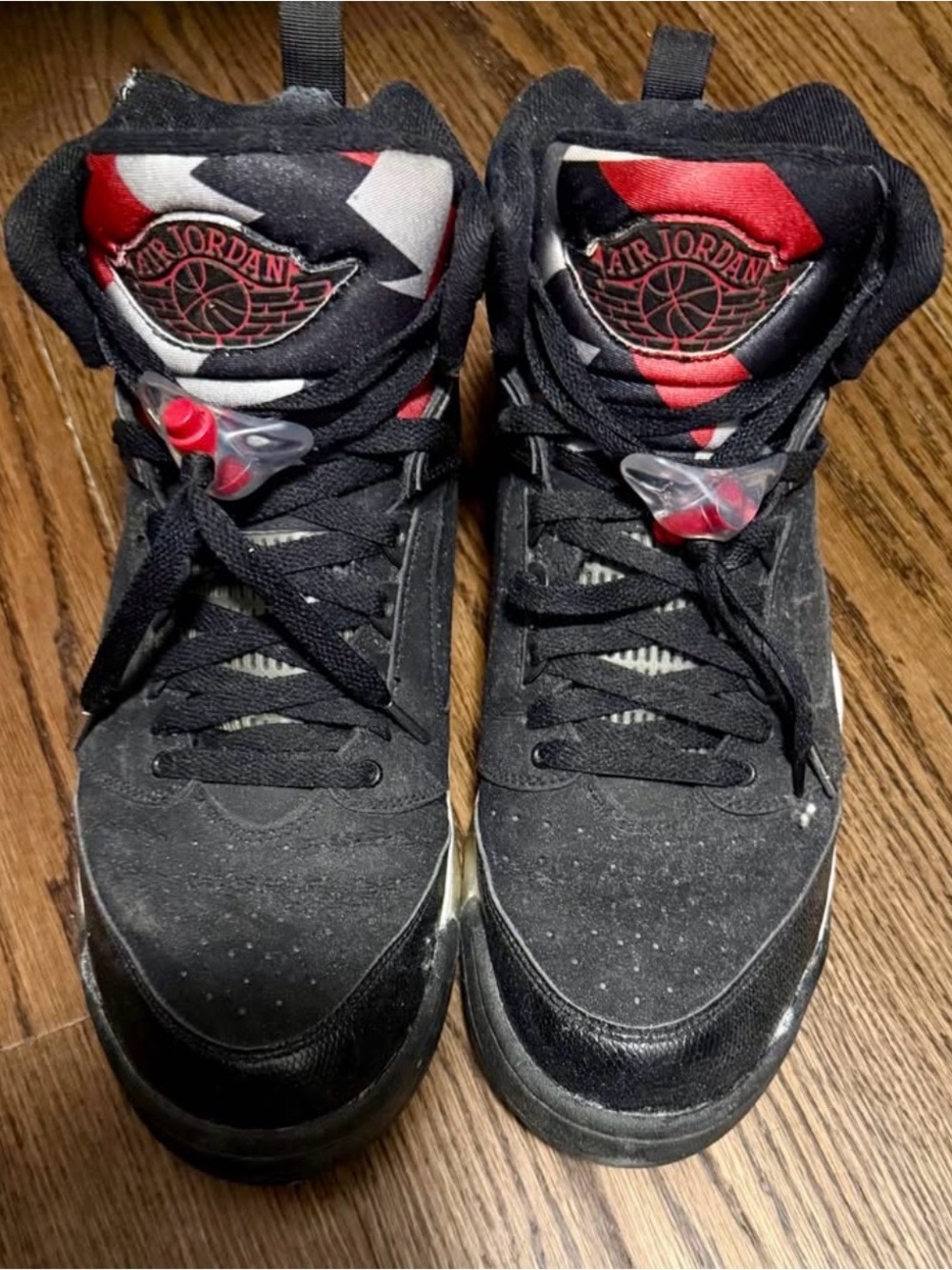 Jordan 1 men’s Black and Red High-Top Sneakers